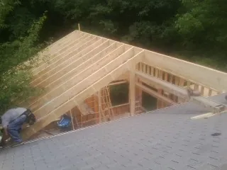 Framing a new roof addition that ties into an existing shingle roof in Palmetto
