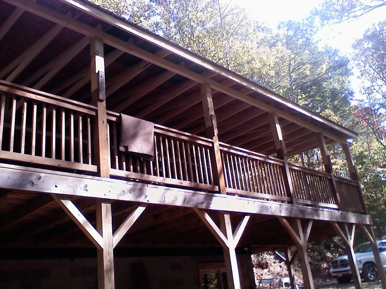 Timber framing under a new elevated porch and deck — Roof Leak Repair in Palmetto by Roofing Brothers